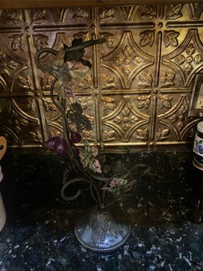 Ornamental Metal wine bottle  Stand with Pink and Green Floral Accents